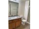 Bathroom with wood cabinets and a shower/tub combo at 9580 W Reno Ave # 114, Las Vegas, NV 89148