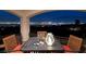 Balcony featuring city views, outdoor seating, and a table set for a night of relaxation at 2781 Josephine Dr, Henderson, NV 89044