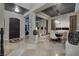 Grand foyer with elegant tile flooring, dark wood door, and open access to the formal dining room at 2781 Josephine Dr, Henderson, NV 89044