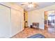 Bedroom with double closets and view to hallway at 123 Fir St, Henderson, NV 89015