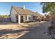 Spacious backyard with a covered patio and plenty of room for outdoor activities at 2525 Kirkmichael Ln, Henderson, NV 89014