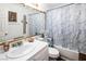 Clean bathroom with a shower/tub combo and updated vanity at 2525 Kirkmichael Ln, Henderson, NV 89014