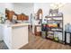 Kitchen with wood cabinets, island, and breakfast bar at 2525 Kirkmichael Ln, Henderson, NV 89014