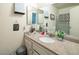 Bathroom boasts granite countertop, sink, and shower at 3544 Sandcliff Ln, Las Vegas, NV 89121
