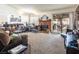 Spacious living room features a fireplace and sliding glass doors leading to the backyard at 3544 Sandcliff Ln, Las Vegas, NV 89121