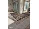 Well-maintained backyard corner with decorative rocks and lush greenery, creating a peaceful outdoor space at 913 Pro Players Dr, Las Vegas, NV 89134