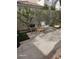 Inviting backyard patio with comfortable seating and a grill, perfect for outdoor entertaining at 913 Pro Players Dr, Las Vegas, NV 89134