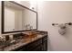 Stylish bathroom with a unique glass sink, marble countertop, and modern fixtures at 913 Pro Players Dr, Las Vegas, NV 89134