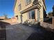 Backyard patio with a stone border at 117 Logan Pond Way, North Las Vegas, NV 89084