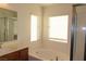 Bathroom with a large garden tub and shower at 117 Logan Pond Way, North Las Vegas, NV 89084