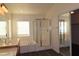 Elegant bathroom with soaking tub, shower, and double vanity at 117 Logan Pond Way, North Las Vegas, NV 89084