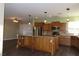 Modern kitchen with stainless steel appliances and an island at 117 Logan Pond Way, North Las Vegas, NV 89084