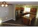 Kitchen with island and stainless steel appliances at 117 Logan Pond Way, North Las Vegas, NV 89084