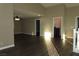 Sunlit living room with high ceilings and ceiling fan at 117 Logan Pond Way, North Las Vegas, NV 89084