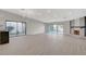 Spacious living room with hardwood floors, fireplace, and sliding glass doors at 3012 Plaza De Rosa, Las Vegas, NV 89102