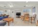 Combined living and dining area with a table and chairs at 6058 Ambleshire Ave, Las Vegas, NV 89139