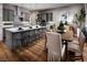 Modern kitchen with large island and stainless steel appliances at 10356 Aquila Crest Ave, Las Vegas, NV 89166