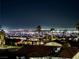 Night view of city lights from a home's rooftop at 1904 Las Palmas Ln # 203, Laughlin, NV 89029