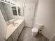 Clean bathroom with updated vanity and toilet at 1904 Las Palmas Ln # 203, Laughlin, NV 89029