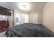 Spacious bedroom with a large bed and access to the bathroom at 1904 Las Palmas Ln # 203, Laughlin, NV 89029