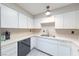 Bright kitchen with white cabinets and modern appliances at 1904 Las Palmas Ln # 203, Laughlin, NV 89029