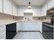 Kitchen with white cabinets, stainless steel appliances at 1904 Las Palmas Ln # 203, Laughlin, NV 89029