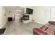 Open living space with fireplace and kitchen view at 1904 Las Palmas Ln # 203, Laughlin, NV 89029