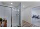 Bathroom with a walk-in shower and linen storage at 4132 Spring Storm Ave, North Las Vegas, NV 89081