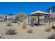 Community park with playground, covered picnic area, and landscaping at 4132 Spring Storm Ave, North Las Vegas, NV 89081