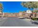 Gated community entrance with attractive landscaping and signage at 4132 Spring Storm Ave, North Las Vegas, NV 89081