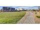 Open green space with a winding pathway at 4132 Spring Storm Ave, North Las Vegas, NV 89081