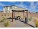 Relaxing community area with a shaded picnic table at 4132 Spring Storm Ave, North Las Vegas, NV 89081