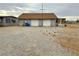 Spacious detached garage featuring dual doors and ample parking space at 2510 N Woodchips Rd, Pahrump, NV 89060