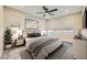 Spacious main bedroom with ceiling fan and large windows at 4294 Eagle Summit Ave # 0, Las Vegas, NV 89141