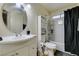 Clean bathroom with a bathtub, shower, and vanity at 4690 E Utah Ave, Las Vegas, NV 89104