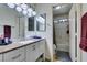 Clean bathroom, granite countertop, and updated vanity at 4690 E Utah Ave, Las Vegas, NV 89104