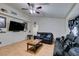 Living room with hardwood floors and a ceiling fan at 4690 E Utah Ave, Las Vegas, NV 89104