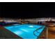 Night view of rooftop pool and spa area at 150 Las Vegas Blvd # 814, Las Vegas, NV 89101