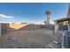 Large backyard featuring a block wall, landscaping potential, and ample space at 3456 Beca Faith Dr, North Las Vegas, NV 89032