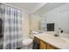 Bathroom featuring a shower-tub combo and a vanity with a sink at 3456 Beca Faith Dr, North Las Vegas, NV 89032