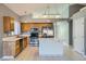 Kitchen featuring stainless steel appliances, a kitchen island, and plenty of cabinet space at 3456 Beca Faith Dr, North Las Vegas, NV 89032