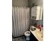 Simple bathroom with a shower/tub combo and a small vanity at 10753 Cather Ave, Las Vegas, NV 89166