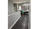 Upper hallway with home gym and hardwood floors at 10753 Cather Ave, Las Vegas, NV 89166