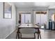 Bright dining room with modern table set, stylish chairs, and natural light at 175 Enloe St, Henderson, NV 89074