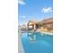 Inviting backyard pool offers a refreshing escape with serene surroundings and ample space at 175 Enloe St, Henderson, NV 89074