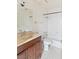 Bathroom featuring a vanity with a marble countertop, tiled floors, and a shower-tub combo at 1965 Scimitar Dr # 0, Henderson, NV 89014