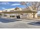 Assigned covered parking spaces for residents in front of the building, with nearby landscaping at 1965 Scimitar Dr # 0, Henderson, NV 89014