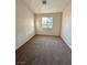 Bright bedroom with neutral walls and carpeted floor at 2521 Sierra Luna Ave # 106, Las Vegas, NV 89106