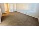 Carpeted bedroom with neutral walls and ample space at 2521 Sierra Luna Ave # 106, Las Vegas, NV 89106