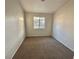 Well-lit bedroom featuring neutral walls and carpet at 2521 Sierra Luna Ave # 106, Las Vegas, NV 89106